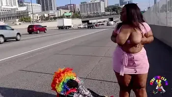 Juicy Tee Gets Fucked by Gibby The Clown on A Busy Highway During Rush Hour