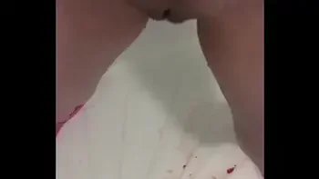 Brunette pissing during her period standing change pad showing dirty pussy and dirty pad