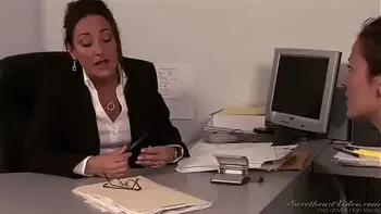 Lesbian boss fucks her secretary with strapon