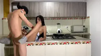 Passionate sex in the kitchen and a lot of cum at the end