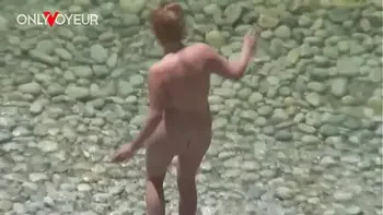 Beach Voyeur. Mature couple fucking under the shining sun