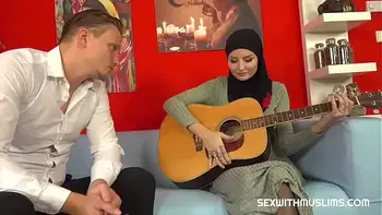 She's better at holding a dick than a guitar