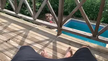 While my wife is tanning in the pool, my sister-in-law fucks me on the balcony