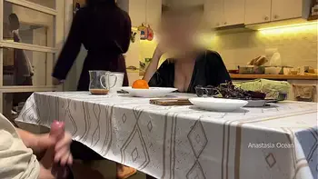 My husband jerking under a table front of my step mom and i right at the kitchen.
