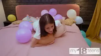 MY18TEENS - Skinny girl with small tits blows up balloons and fucks herself with a dildo