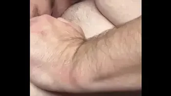 Hooker enjoys watching herself on camera as she gets fucked bareback - then takes a load of cum in her mouth!!!!