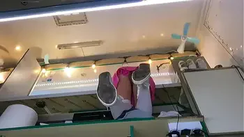 The boss is playing with his sexy shop assistant pussy while she talks to the customer