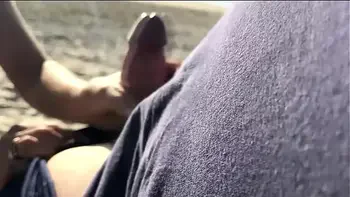 The milf suddenly came up from behind and started jerking me off in front of everyone