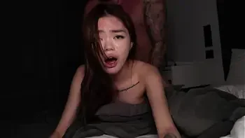 Young Asian girl with small tits trembles from orgasms