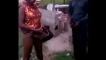 African woman fucks her man in public