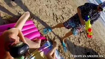 My girlfriend on the beach with the lifeguard's cock in her ass