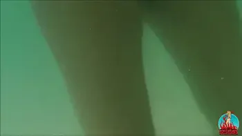 my husband, my unicorn and me in erotic play on a public beach.