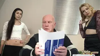 Old manager at the office fucks his two beautiful assistants right in his office he puts his cock inside their pussies fuck them hard and cums right in their mouths so he can watch them lick the cumshot and spit it