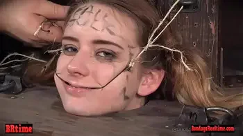 Bdsm babe trapped in a barrel and electrified
