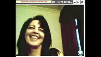 Brunette showing tits on cam