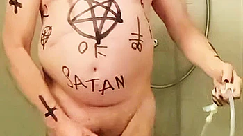 Satan slave takes perverted enema treatment