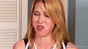 Janira tied and gagged on chair.