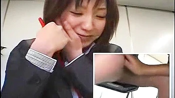 Her pants are taken off, a vibrator is inserted, and she squirts with fingering.