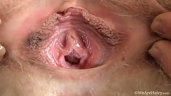 Nadin strips after getting bored watching tv - WeAreHairy