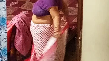 Aunty caught red handed on camera while changing dress.