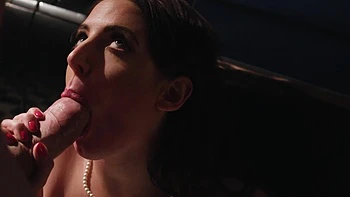 Angela White gets her pussy filled by a huge cock in a passionate scene.