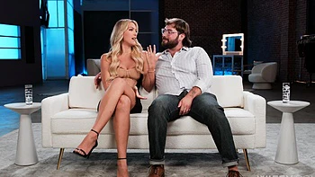 Savvy Suxx rides a big cock while her husband watches, showcasing her insatiable appetite.