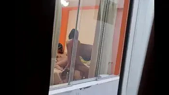 I spy on my friends from my room (work trip). I can't believe my friend is cheating on her husband.