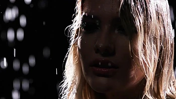 Sexy blonde MILF flaunts wet nude figure