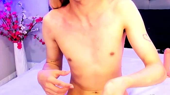 Gorgeous femboy fingering and toying her ass