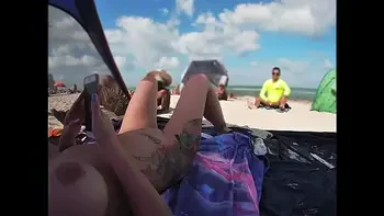 Exhibitionist Wife 511 - Mrs Kiss gives us her NUDE BEACH POV view of a VOYEUR JERKING OFF in front of her and several other men watching!