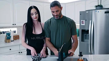 The busty housewife Violet Voss is caught in a steamy scene.