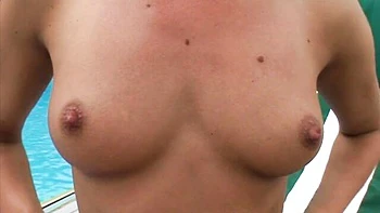 Blonde chick Sophie Moone sticks a pink dildo in her shaved pussy