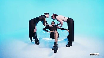 Miss Flora and Muriel La Roja are fucking with a big strapon