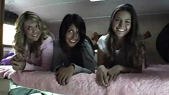 Sexy petite lesbians teasing the camera in close up