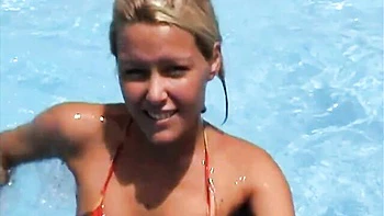 Sophie Moone shows off her nice bikini body by the poolside