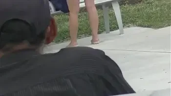 Upskirt Wife 27 - Heather Silk flashing her shaved pussy to voyeurs in public park!