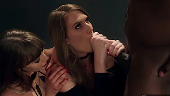 Two cute girls, Ashley Lane and Naomi Swann, share a big black cock in an intense threesome.