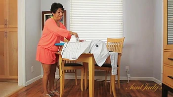 Izabel masturbates after ironing.