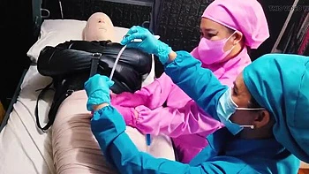 Nurse DominaFireOfficial Mummifies Patient & Fingers His Cock Sounding For Cum - Medical BDSM Bondage