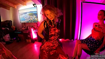 Two lesbian strippers have fun on the floor, showing their nice ass