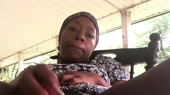 Black Babe Squirts in the Rain