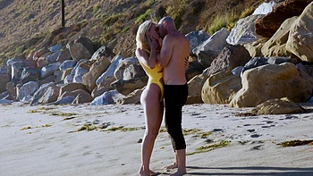 Hot couple Natalia Starr and Johnny Sins enjoy sex on beach