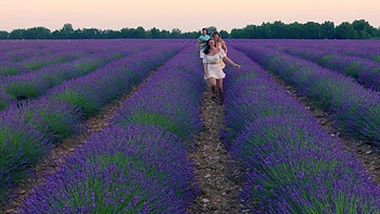 Two hot milfs and a guy in an outdoor threesome adventure