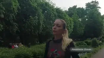 Public walk in transparent t-shirt in peak hour