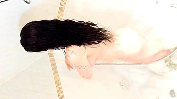 Busty curly brunette with big boobs fucks on couch